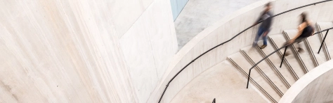 People walking down a staircase