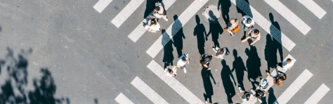 People crossing a busy road