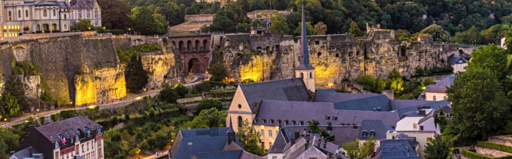 6e06ee8aea79-Luxembourg-1086x202.png.webp